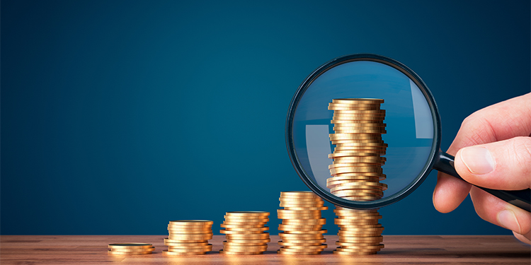 Coins stacked in columns to depict the proper way to structure the sale for the best financial outcome.