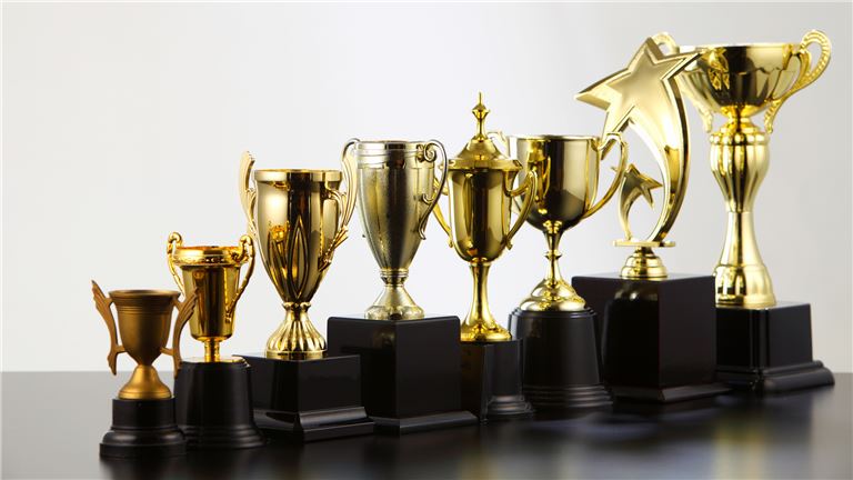 Recognition Products Business with Real Estate